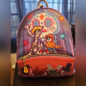 Loungefly Pixar Miguel and Hector Performance Mini Backpack